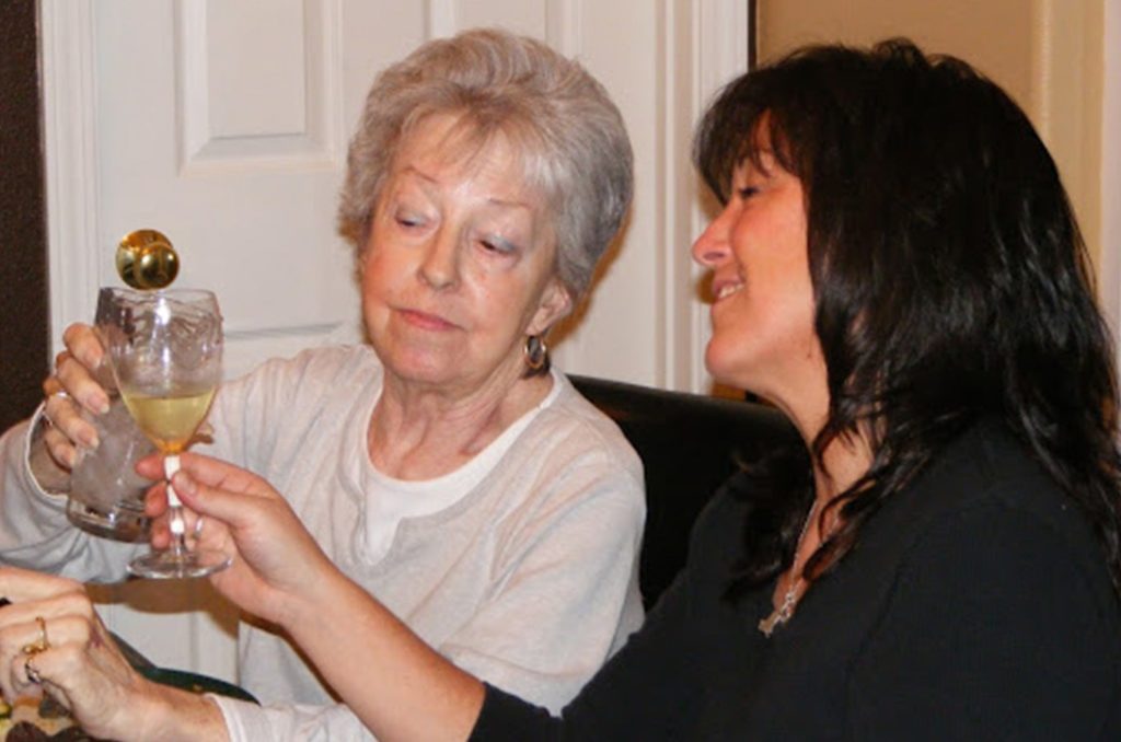 Kim and her mom Carolyn toasting