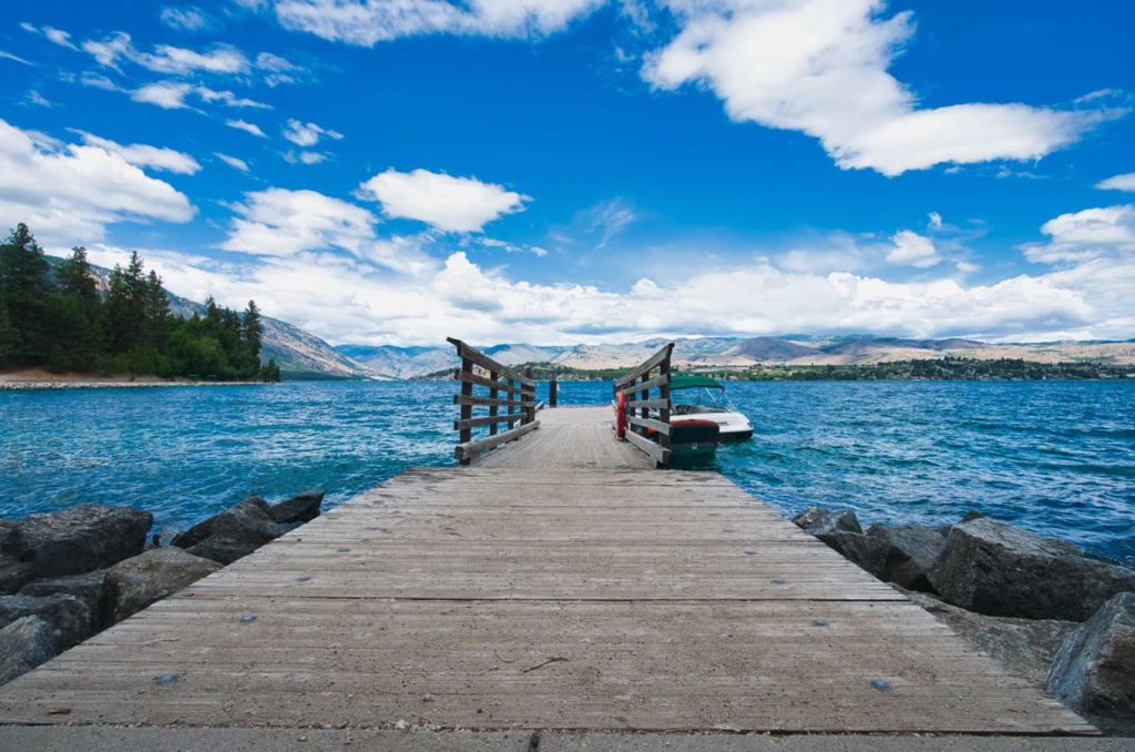 Dock on the Lake Chelan shoreline during a sunny day