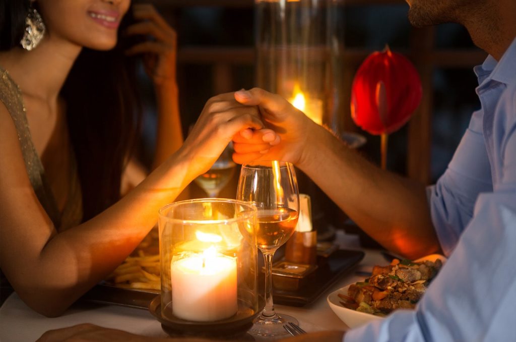 Couple enjoying a romantic dinner in Lake Chelan