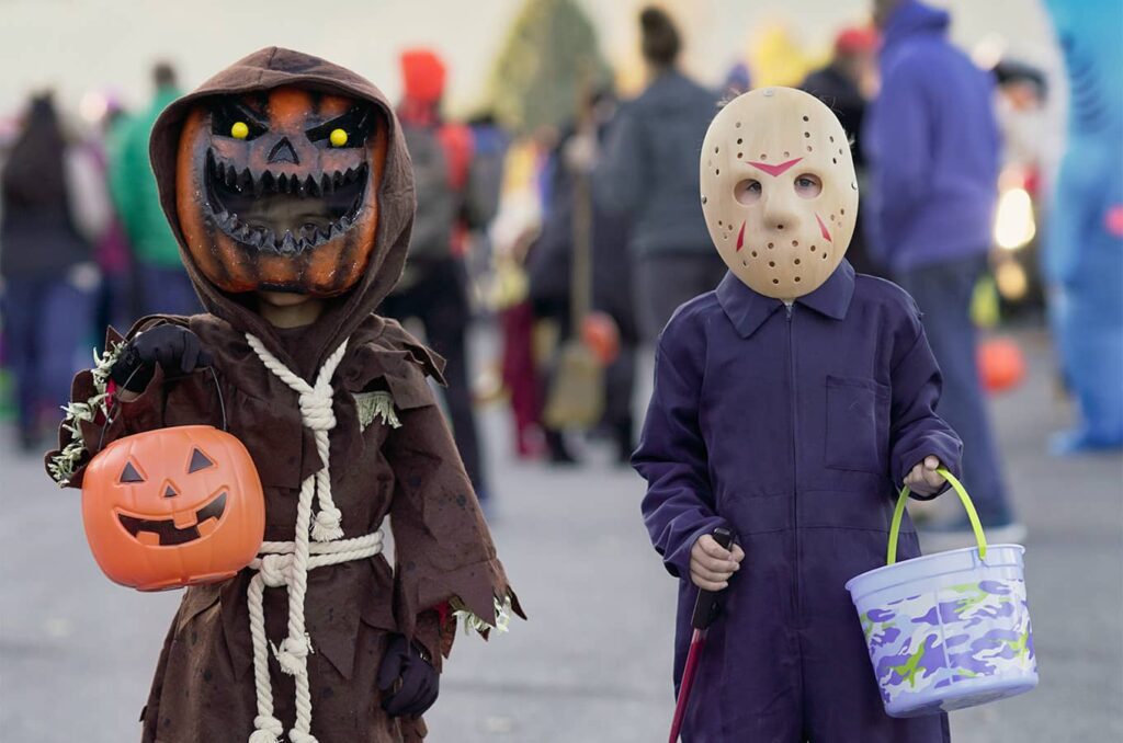 Kids dressed up like scary monsters